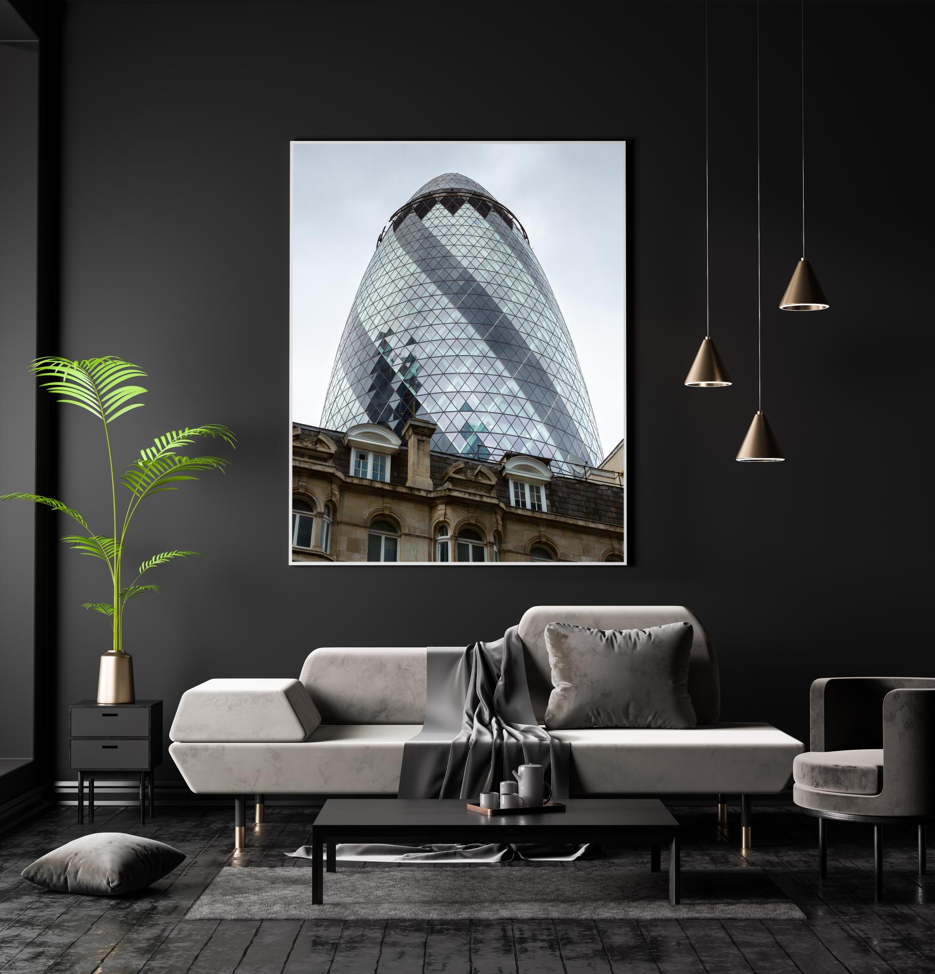 The Gerkin building London rising up behind the old traditional rooftops in the foreground.London Architectural Photographer, Liane Ryan Photography