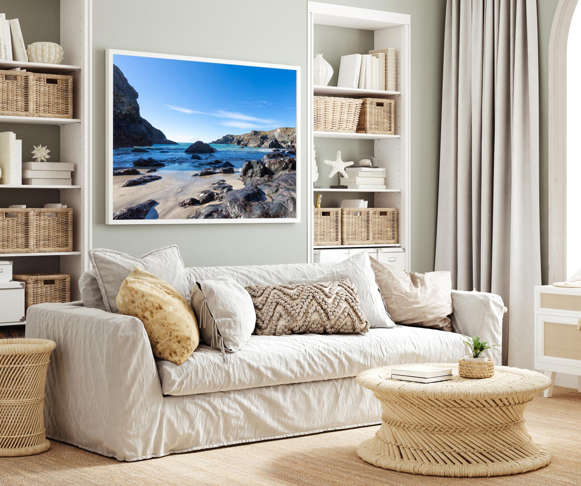 Kynance Cove Cornwall at low tide showing rocks and waters edge, sunny day with blue sky. Liane Ryan Photography