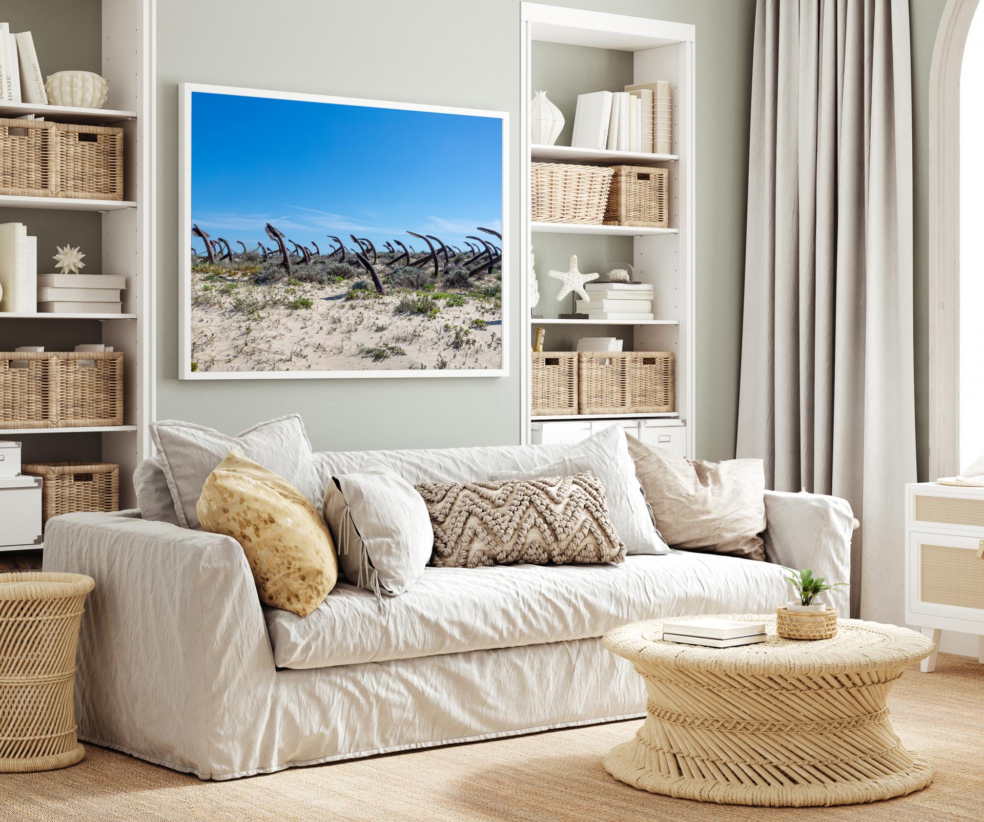 The old anchors from the tuna boats at Barril Beach on a sunny day with blue sky. Liane Ryan Photography