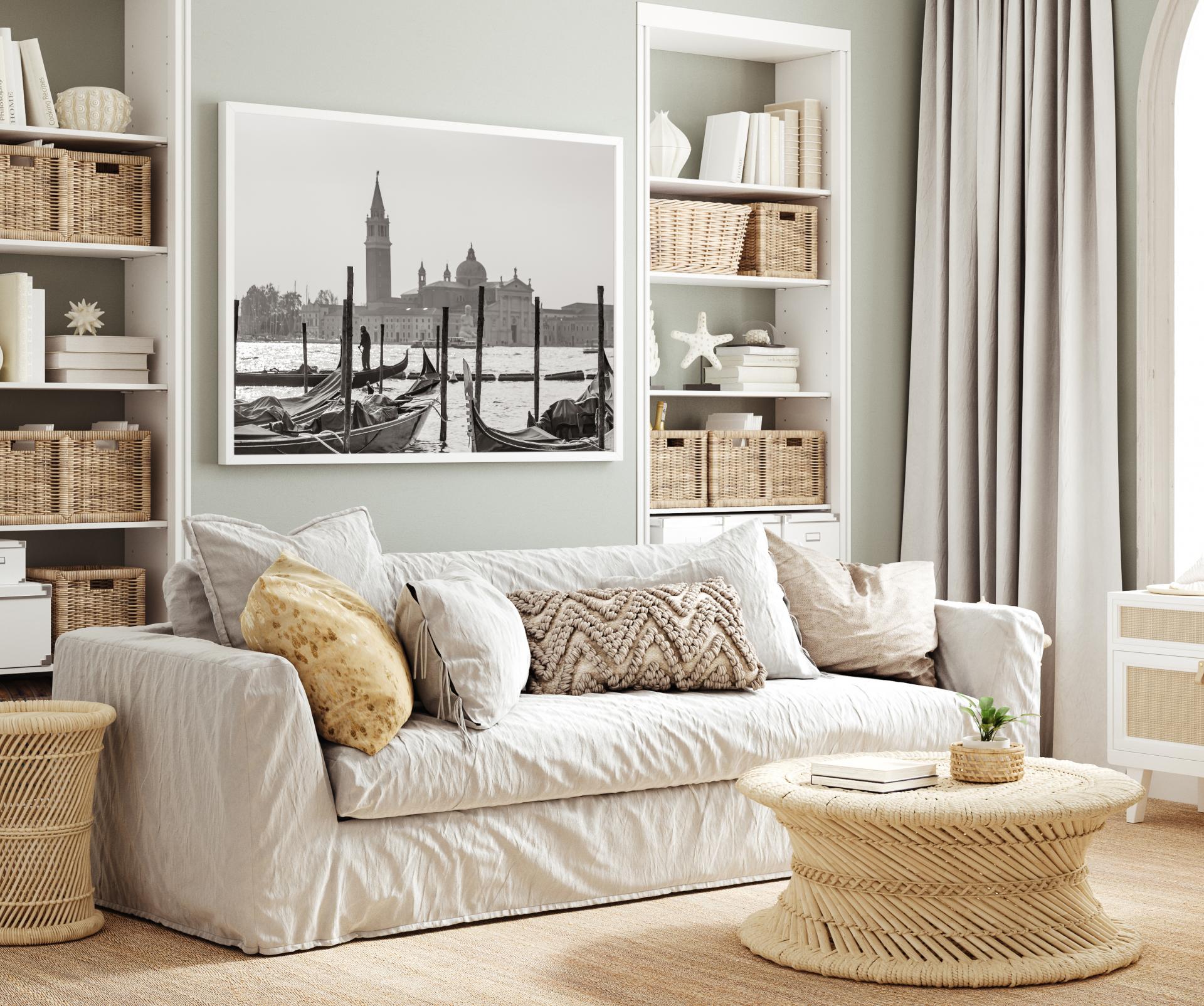 View from Saint Marks Square out to the water and the gondolas moored up, one man working his gondola out in the water. Liane Ryan Photography